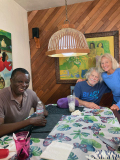 Faustino, Don and Donna. Don’s paintings are on the wall.